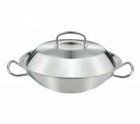 Fissler Wok Profi Collection mit Metalldeckel aus Edelstahl Fissler Wok Profi Collection mit Metalldeckel aus Edelstahl