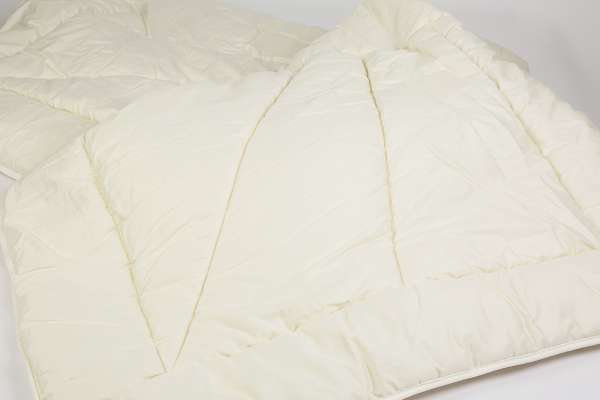 Schurwoll Bettdecke: Atmungsaktive Schurwolle für den Sommer